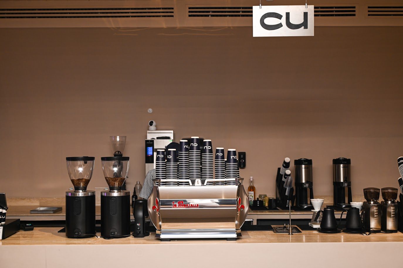 The café counter and seating at Bowlo